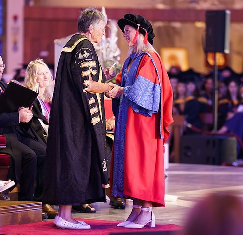 Honorary recipient receiving award